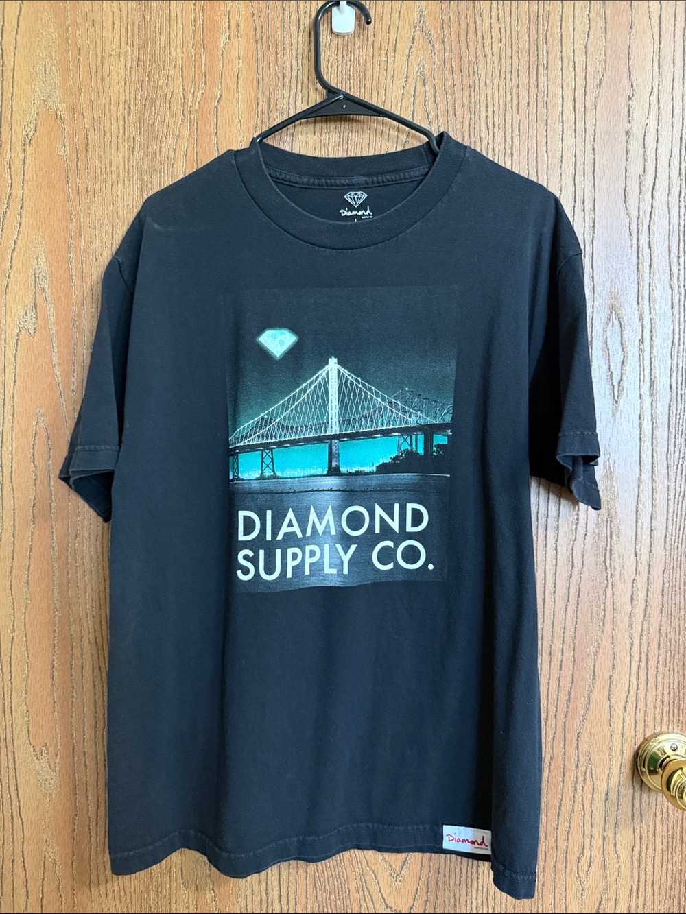 Diamond Supply Co. Black Tee with Teal Bridge Graphic